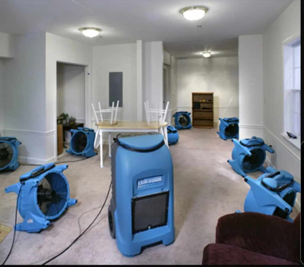 Air movers and dehumidifier setup for Water Damage Restoration in Lindenhurst